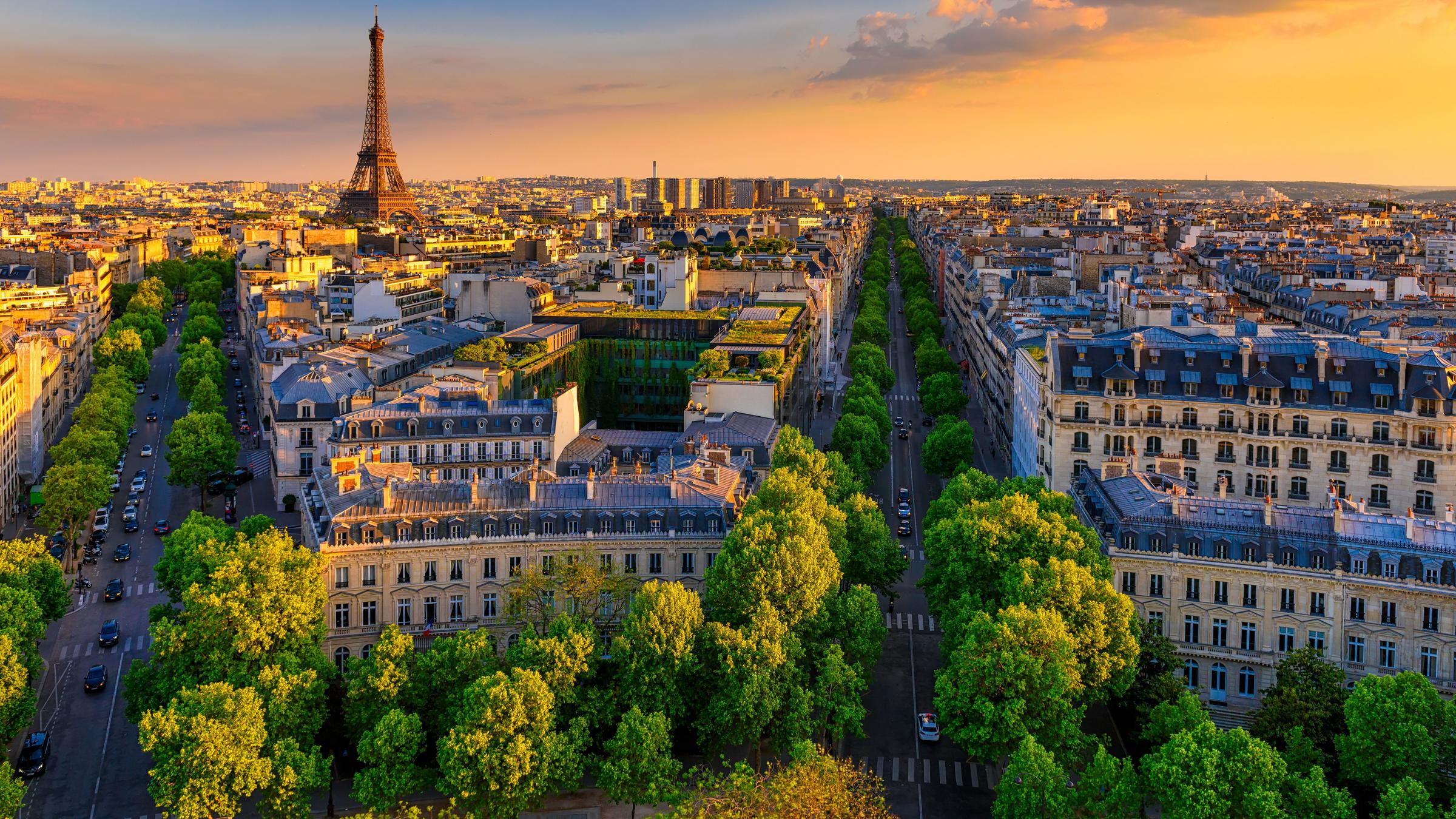 France Tourism view across Paris rooftops